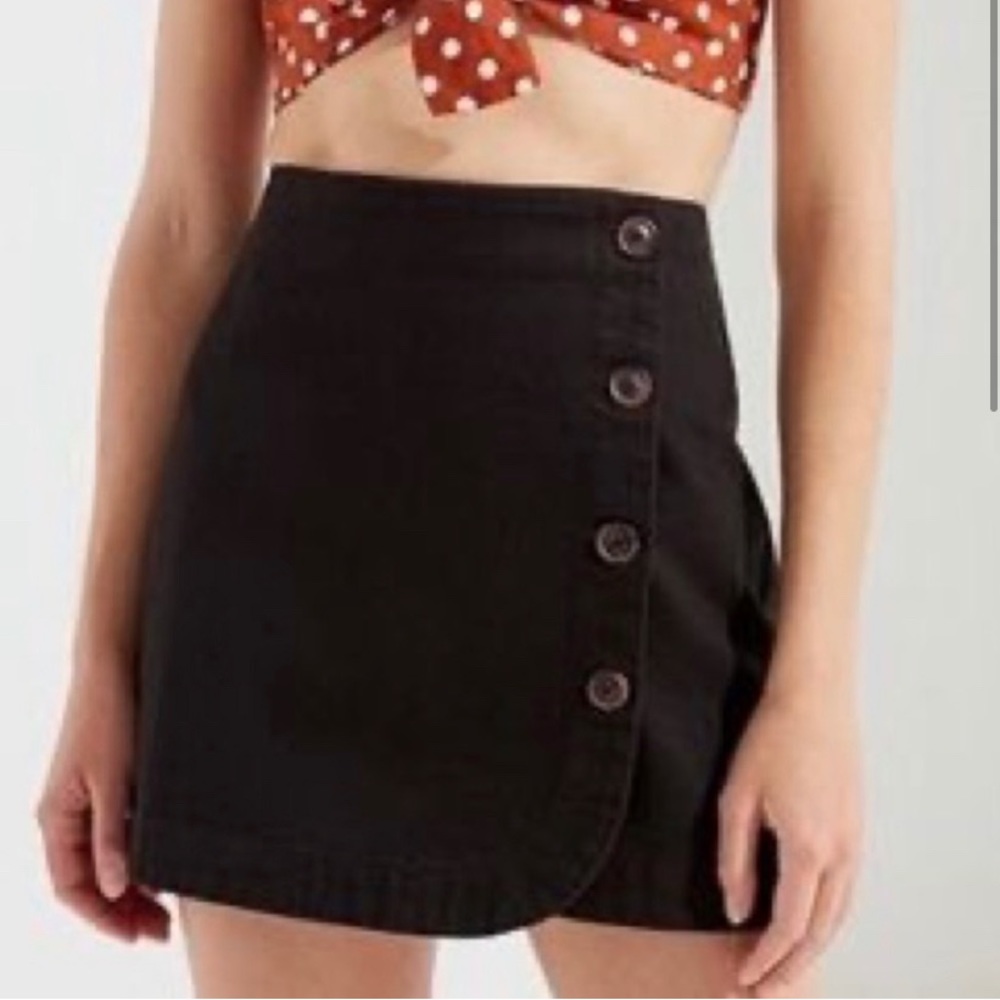 Adorable Urban Outfitters button wrap mini skirt that has only been worn once!